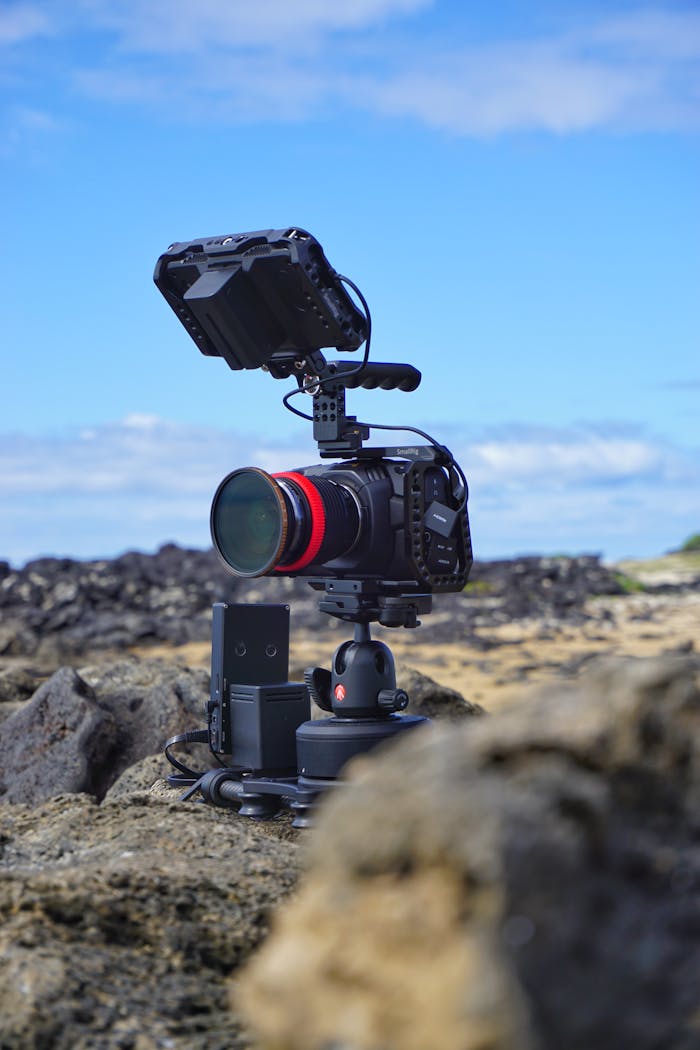 High-resolution camera on rocky beach in Hawaii, perfect for videography.